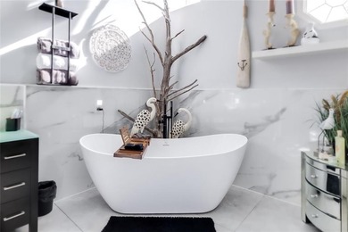 Stunning Waterfront Home in Sutherland Bluff! Pictures don't do on Sapelo Hammock Golf Club in Georgia - for sale on GolfHomes.com, golf home, golf lot