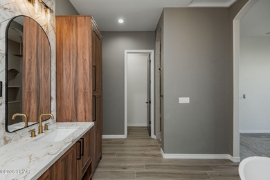 Stunning New Construction on the Los Lagos Golf Course! This on Los Lagos Golf Club in Arizona - for sale on GolfHomes.com, golf home, golf lot