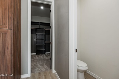 Stunning New Construction on the Los Lagos Golf Course! This on Los Lagos Golf Club in Arizona - for sale on GolfHomes.com, golf home, golf lot