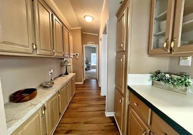 Updated 2/bd2/ba home offers an ideal blend of elegance & on Del Tura Golf and Country Club in Florida - for sale on GolfHomes.com, golf home, golf lot