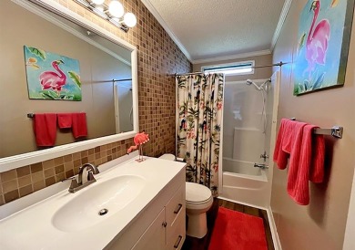 Updated 2/bd2/ba home offers an ideal blend of elegance & on Del Tura Golf and Country Club in Florida - for sale on GolfHomes.com, golf home, golf lot