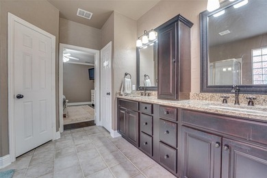 Located in the beautiful guard-gated community of Heritage Lakes on Heritage Lakes - Par 3 - 9 Hole Course in Texas - for sale on GolfHomes.com, golf home, golf lot