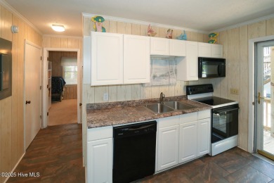 Once in a while, the perfect beach home comes on the market at on Founders Club At St. James Plantation in North Carolina - for sale on GolfHomes.com, golf home, golf lot