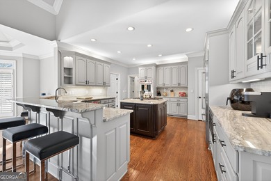 Stunning luxury home located in the prestigious, gated Sugarloaf on TPC At Sugarloaf Golf Club in Georgia - for sale on GolfHomes.com, golf home, golf lot