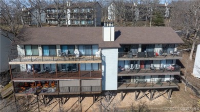 Experience easy lakeside living at 101 Circle Edge #20-3A in on Seasons Ridge At Four Seasons in Missouri - for sale on GolfHomes.com, golf home, golf lot