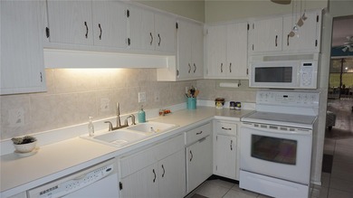 BEACON WOODS - WEDGEWOOD 1ST FLOOR CONDO, 55+ GOLF COURSE on Beacon Woods Golf Club in Florida - for sale on GolfHomes.com, golf home, golf lot