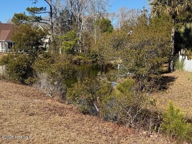 Welcome to the answer to finding perfect spot to build your on Members Club At St. James Plantation in North Carolina - for sale on GolfHomes.com, golf home, golf lot