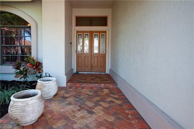 STUNNING ESTATE HOME WITH LAKE AND GOLF COURSE VIEWS: 
This on Worthington Country Club in Florida - for sale on GolfHomes.com, golf home, golf lot