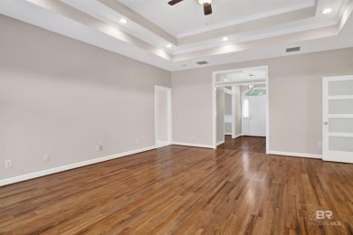 This spacious 4-bedroom, 2.5-bathroom home is perfectly situated on Lake Forest Yacht and Country Club in Alabama - for sale on GolfHomes.com, golf home, golf lot