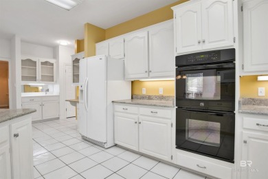This spacious 4-bedroom, 2.5-bathroom home is perfectly situated on Lake Forest Yacht and Country Club in Alabama - for sale on GolfHomes.com, golf home, golf lot