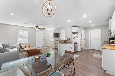 Welcome to this update 1,480 square foot home in the wooded on Bella Vista - Metfield Golf Complex and Country Club in Arkansas - for sale on GolfHomes.com, golf home, golf lot