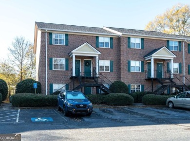 End unit condo available for immediate occupancy overlooking on University of Georgia Golf Course in Georgia - for sale on GolfHomes.com, golf home, golf lot