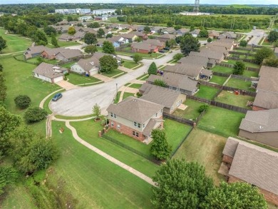Discover this beautifully cared for 4-bedroom, 2 1/2  bath home on Broken Arrow Golf and Athletic Club in Oklahoma - for sale on GolfHomes.com, golf home, golf lot