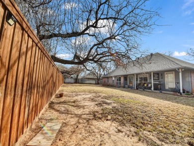 A relaxing Country Club lifestyle is waiting for you! This on Pecan Plantation Country Club in Texas - for sale on GolfHomes.com, golf home, golf lot