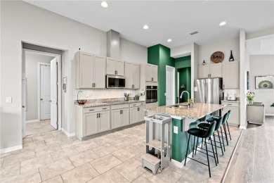 This sophisticated 4-bedroom, 2-bathroom home offers an on Forest Lake Golf Club in Florida - for sale on GolfHomes.com, golf home, golf lot