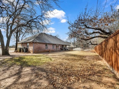 A relaxing Country Club lifestyle is waiting for you! This on Pecan Plantation Country Club in Texas - for sale on GolfHomes.com, golf home, golf lot