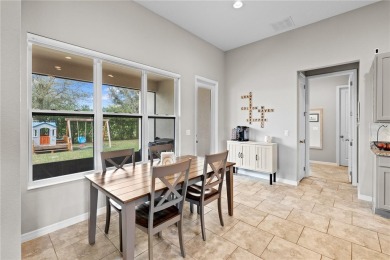 This sophisticated 4-bedroom, 2-bathroom home offers an on Forest Lake Golf Club in Florida - for sale on GolfHomes.com, golf home, golf lot