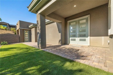 This stunning modern desert home sits on the award-winning Jack on Reflection Bay Golf Club in Nevada - for sale on GolfHomes.com, golf home, golf lot