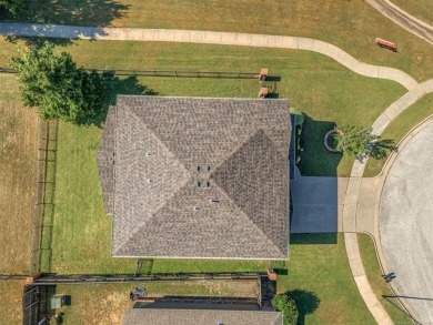 Discover this beautifully cared for 4-bedroom, 2 1/2  bath home on Broken Arrow Golf and Athletic Club in Oklahoma - for sale on GolfHomes.com, golf home, golf lot