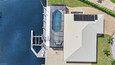 BOATER'S DELIGHT! STUNNING DESIGNER-REMODELED GULF-ACCESS POOL on Fort Myers Beach and Golf Club in Florida - for sale on GolfHomes.com, golf home, golf lot