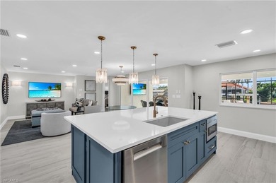 BOATER'S DELIGHT! STUNNING DESIGNER-REMODELED GULF-ACCESS POOL on Fort Myers Beach and Golf Club in Florida - for sale on GolfHomes.com, golf home, golf lot