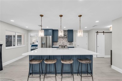 BOATER'S DELIGHT! STUNNING DESIGNER-REMODELED GULF-ACCESS POOL on Fort Myers Beach and Golf Club in Florida - for sale on GolfHomes.com, golf home, golf lot