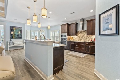 Discover refined coastal living in this beautifully crafted on The Dunes Golf and Beach Club in South Carolina - for sale on GolfHomes.com, golf home, golf lot