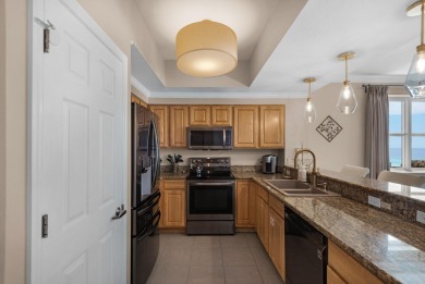 Enjoy the resort lifestyle in this three bedrooom three bath end on Seascape Golf Course in Florida - for sale on GolfHomes.com, golf home, golf lot