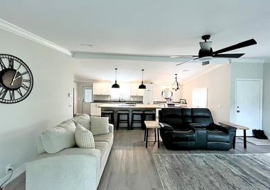 What a show stopper! Stunning 2bd/2/ba home enjoyed a total on Del Tura Golf and Country Club in Florida - for sale on GolfHomes.com, golf home, golf lot