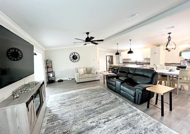 What a show stopper! Stunning 2bd/2/ba home enjoyed a total on Del Tura Golf and Country Club in Florida - for sale on GolfHomes.com, golf home, golf lot