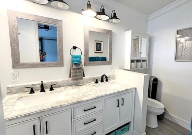 What a show stopper! Stunning 2bd/2/ba home enjoyed a total on Del Tura Golf and Country Club in Florida - for sale on GolfHomes.com, golf home, golf lot