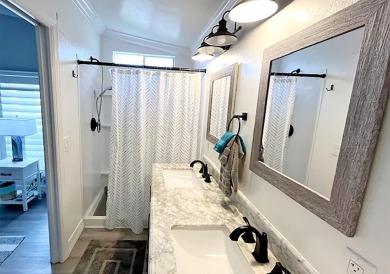 What a show stopper! Stunning 2bd/2/ba home enjoyed a total on Del Tura Golf and Country Club in Florida - for sale on GolfHomes.com, golf home, golf lot