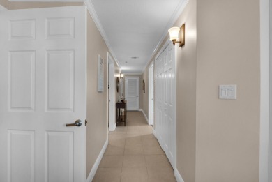 Enjoy the resort lifestyle in this three bedrooom three bath end on Seascape Golf Course in Florida - for sale on GolfHomes.com, golf home, golf lot