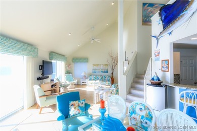 Enjoy panoramic lake views & resort-style living in this on Bear Creek Valley Golf Club in Missouri - for sale on GolfHomes.com, golf home, golf lot