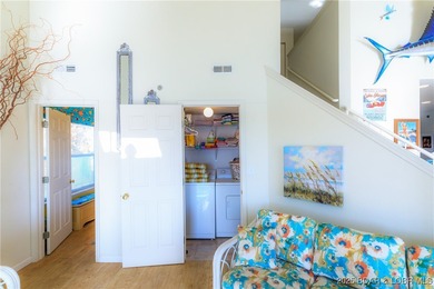 Enjoy panoramic lake views & resort-style living in this on Bear Creek Valley Golf Club in Missouri - for sale on GolfHomes.com, golf home, golf lot