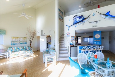 Enjoy panoramic lake views & resort-style living in this on Bear Creek Valley Golf Club in Missouri - for sale on GolfHomes.com, golf home, golf lot