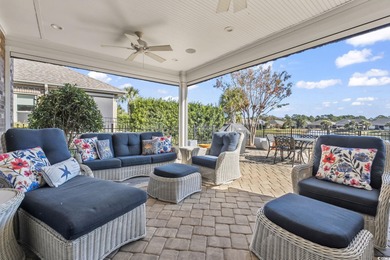 Discover refined coastal living in this beautifully crafted on The Dunes Golf and Beach Club in South Carolina - for sale on GolfHomes.com, golf home, golf lot