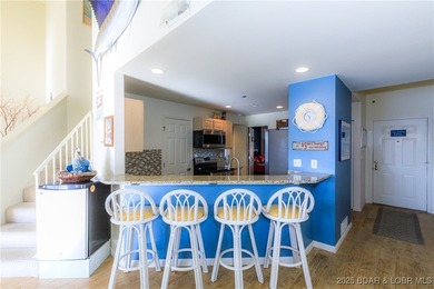 Enjoy panoramic lake views & resort-style living in this on Bear Creek Valley Golf Club in Missouri - for sale on GolfHomes.com, golf home, golf lot