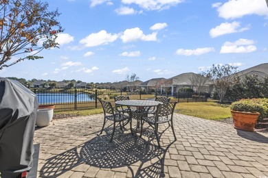 Discover refined coastal living in this beautifully crafted on The Dunes Golf and Beach Club in South Carolina - for sale on GolfHomes.com, golf home, golf lot