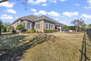 Discover refined coastal living in this beautifully crafted on The Dunes Golf and Beach Club in South Carolina - for sale on GolfHomes.com, golf home, golf lot