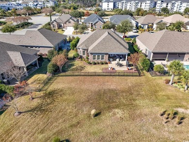 Discover refined coastal living in this beautifully crafted on The Dunes Golf and Beach Club in South Carolina - for sale on GolfHomes.com, golf home, golf lot