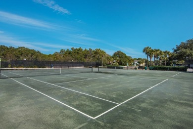 Enjoy the resort lifestyle in this three bedrooom three bath end on Seascape Golf Course in Florida - for sale on GolfHomes.com, golf home, golf lot