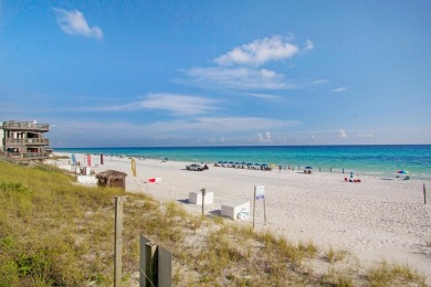 Enjoy the resort lifestyle in this three bedrooom three bath end on Seascape Golf Course in Florida - for sale on GolfHomes.com, golf home, golf lot