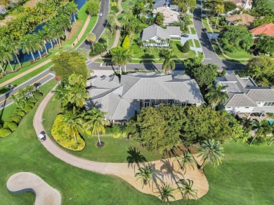 Situated on an Oversized Corner Golf Course lot within the on Boca Grove Golf and Tennis in Florida - for sale on GolfHomes.com, golf home, golf lot