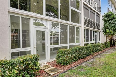 1ST FLOOR FULLY RENOVATED 2/2 CONDO, OPEN CONCEPT KITCHEN WITH on Wynmoor Golf Course in Florida - for sale on GolfHomes.com, golf home, golf lot