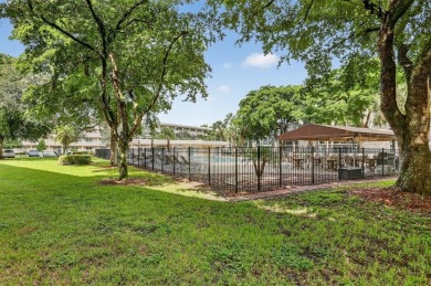 1ST FLOOR FULLY RENOVATED 2/2 CONDO, OPEN CONCEPT KITCHEN WITH on Wynmoor Golf Course in Florida - for sale on GolfHomes.com, golf home, golf lot