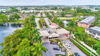 1ST FLOOR FULLY RENOVATED 2/2 CONDO, OPEN CONCEPT KITCHEN WITH on Wynmoor Golf Course in Florida - for sale on GolfHomes.com, golf home, golf lot