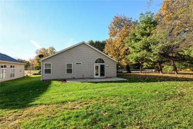 Welcome to your oasis, a meticulously updated ranch-style haven on Mayfair Country Club in Ohio - for sale on GolfHomes.com, golf home, golf lot