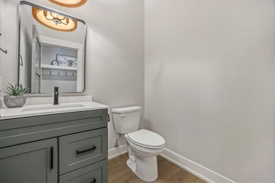 Discover your dream home with effortless living and modern on Oak Ridge Golf Club in Michigan - for sale on GolfHomes.com, golf home, golf lot