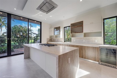 Exquisite turnkey new construction residence offering beautiful on La Gorce Country Club in Florida - for sale on GolfHomes.com, golf home, golf lot